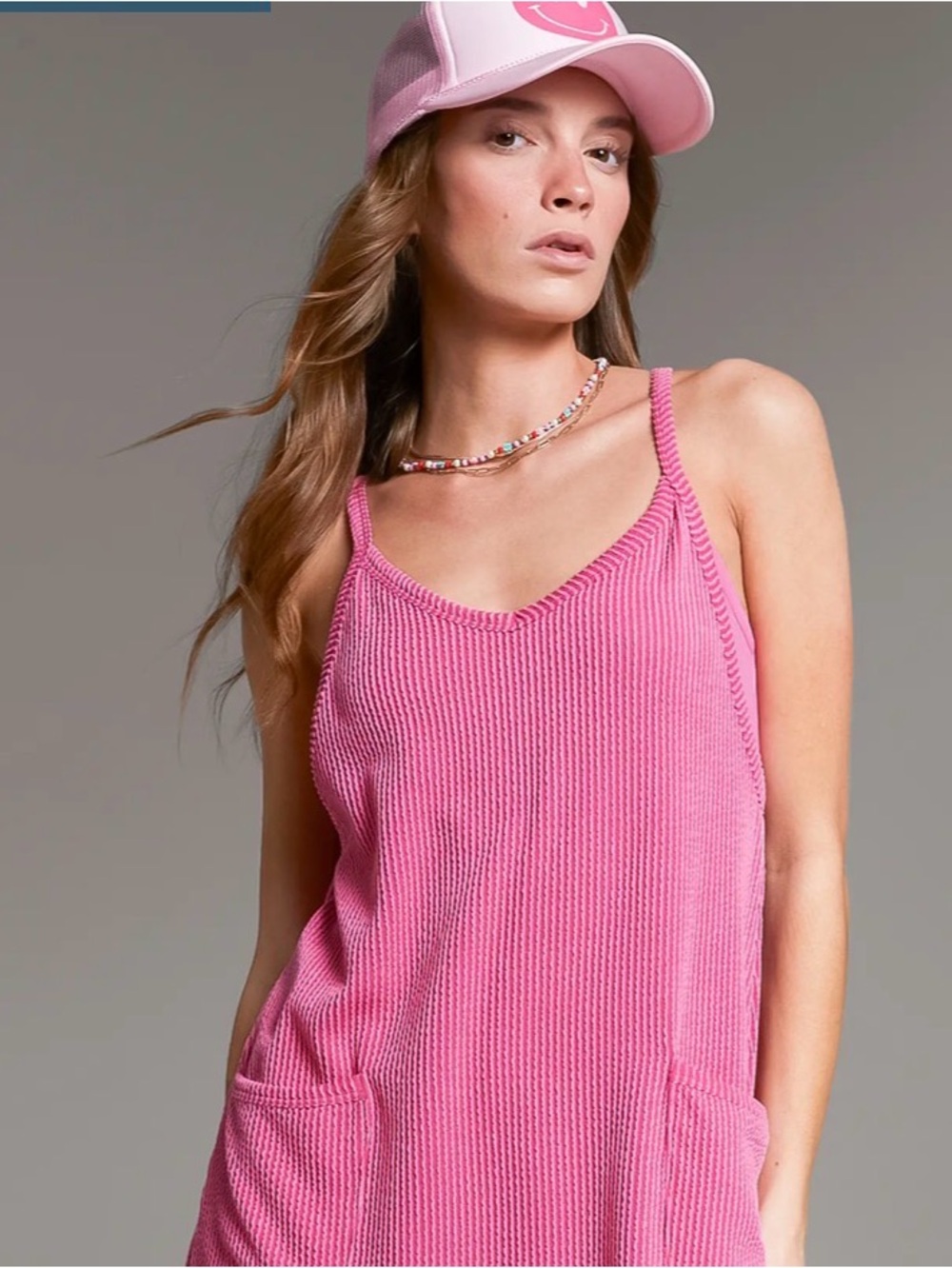Bright pink BKE romper dress with pockets
